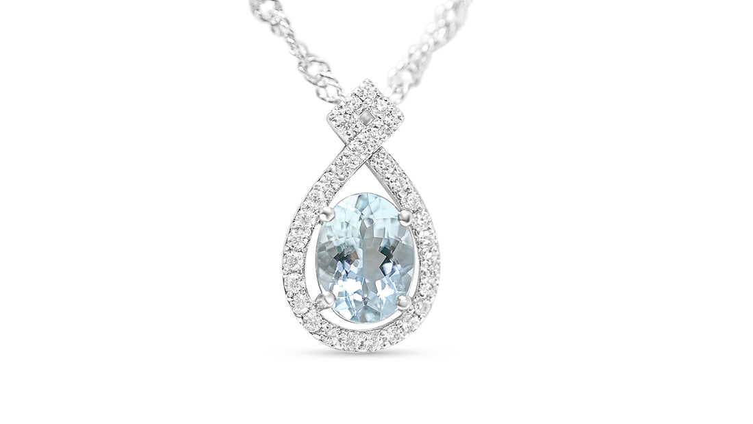 Serene Serenity: Oval Aquamarine Halo Pendant with 1.25 Carats of Sparkling Brilliance (PJC31660P)