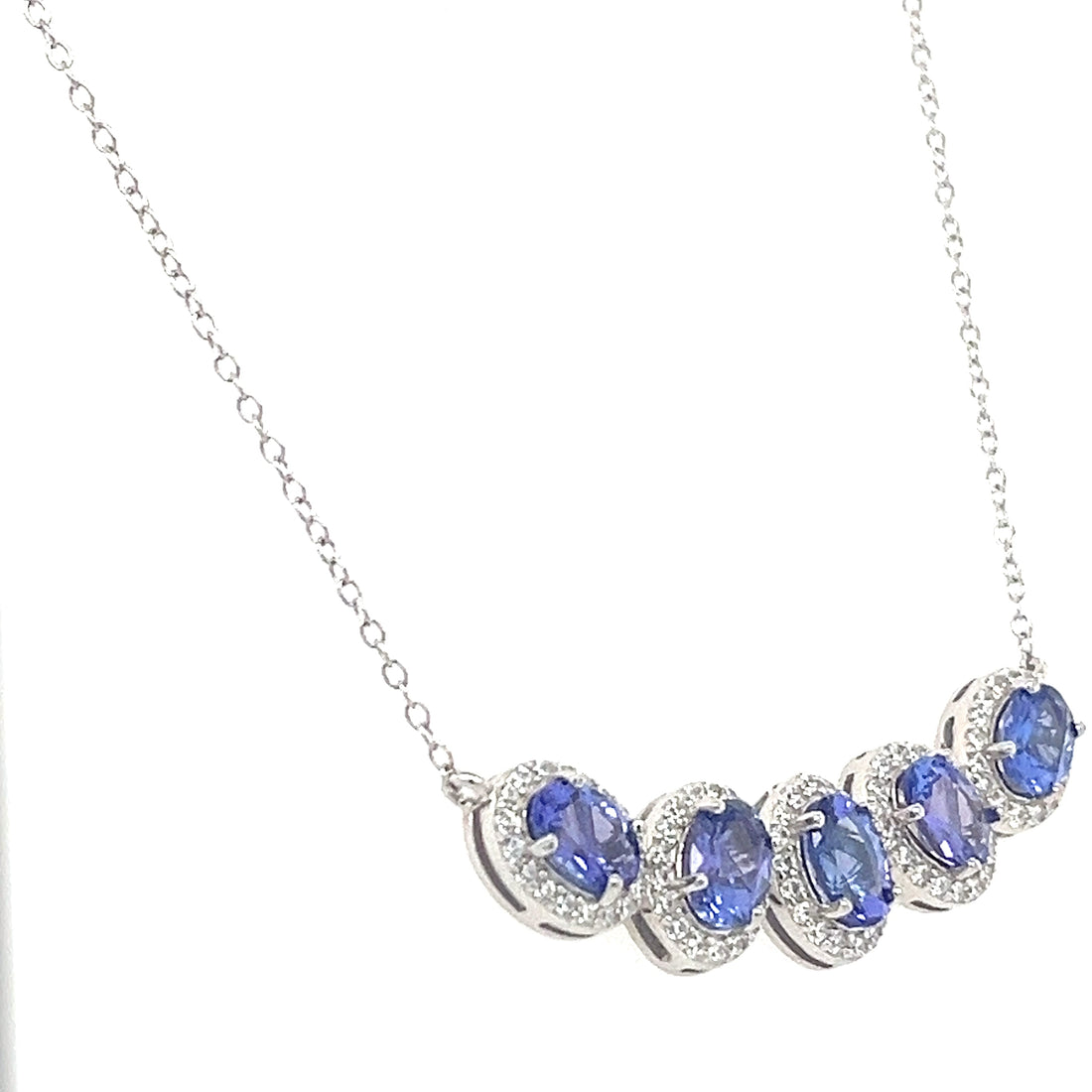 Oval Tanzanite and Round White CZ Rhodium Plated 925 Sterling Silver 156 Cts / 5.60 Gm Necklace PJC6816N